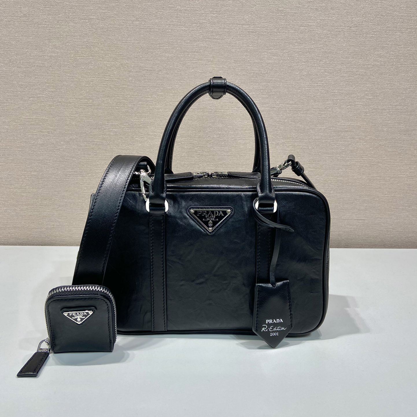 Pra*a top handle bags